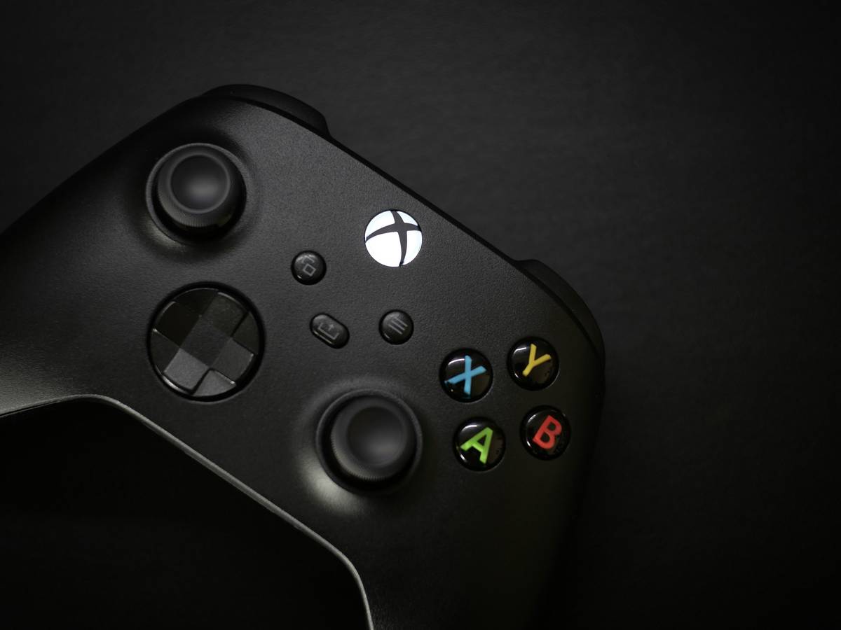 Close-up of pc gaming wiki controllers showing button layouts and connectivity ports